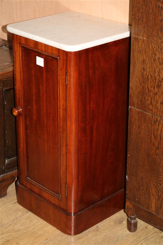 A pair of Victorian mahogany marble topped bedside cupboards W.38cm